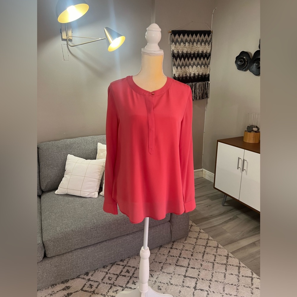 Beautiful blouse with tab sleeves.
